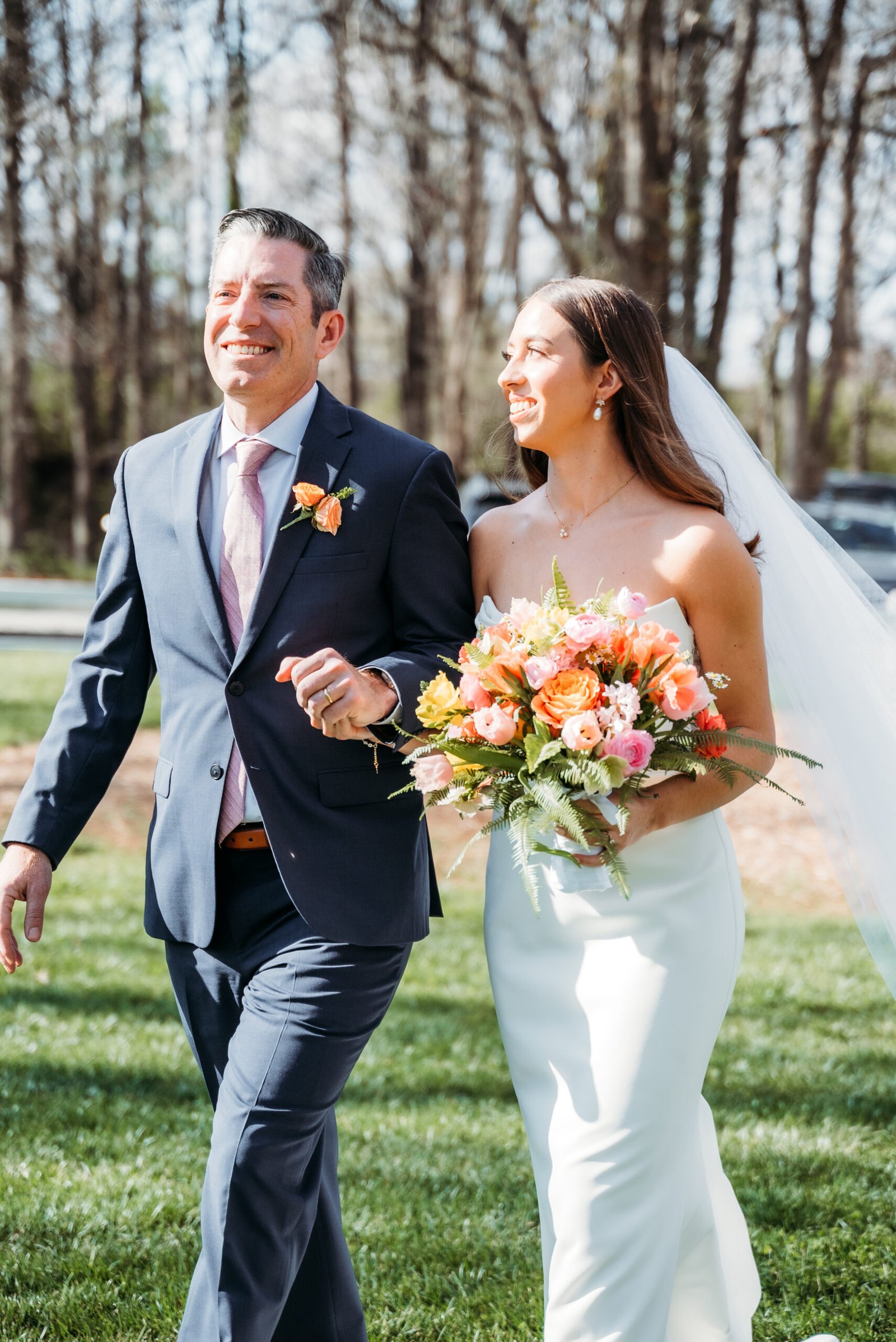 Carolyn Shepard Weddings and Events_bride-groom-walking-bouquet